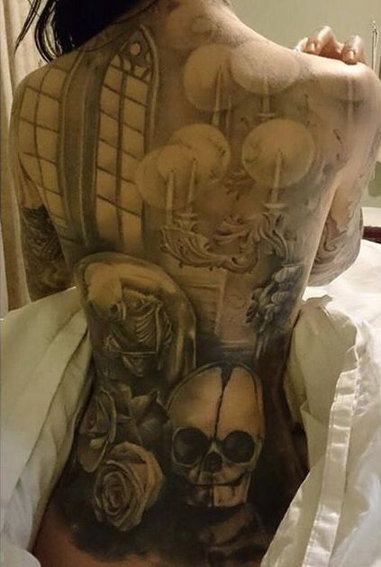 Full back tattoo by Benjamin Laukis