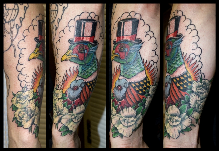 Funny pheasant with a hat tattoo