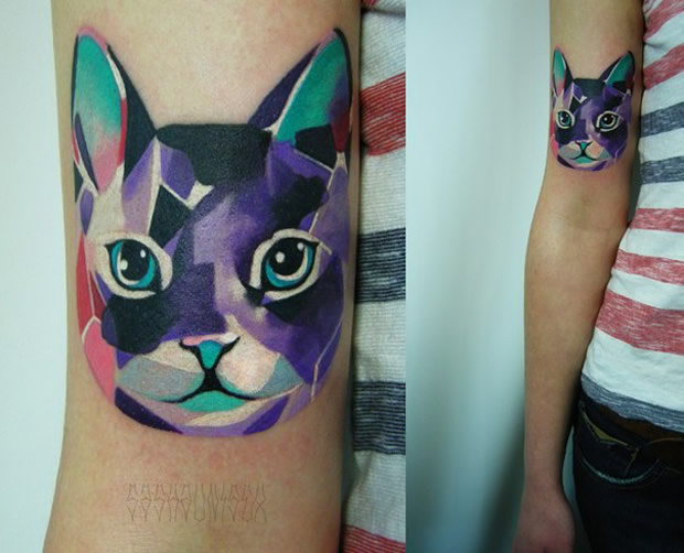 Geometric cat arm tattoo