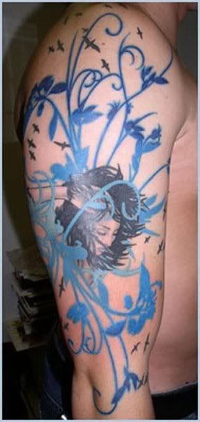 Girl and blue flowers tattoo