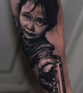 Girl with a gun tattoo by Riccardo Cassese