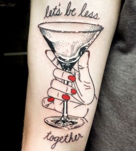 Glass and writing tattoo