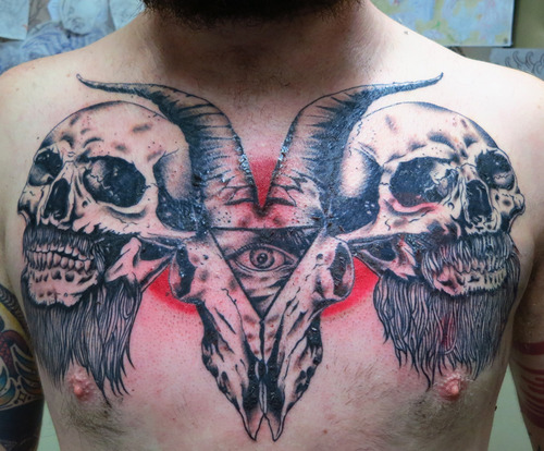 Goat skull and triangle eye tattoo