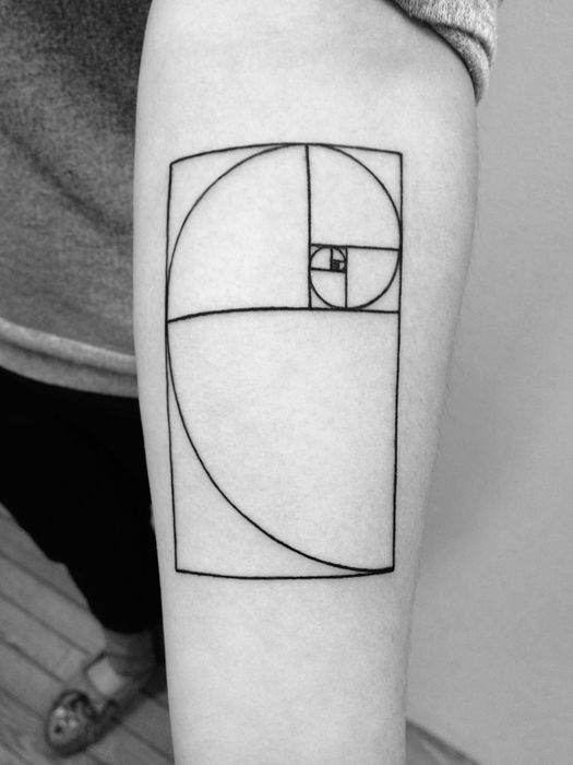 Golden mean black spiral tattoo