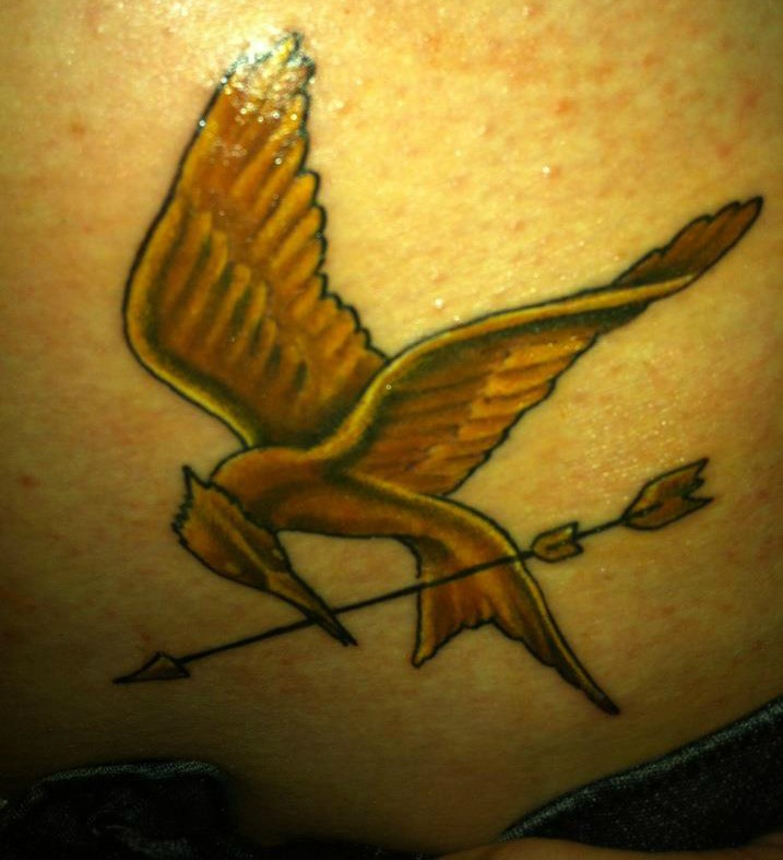 Golden mockingjay tattoo