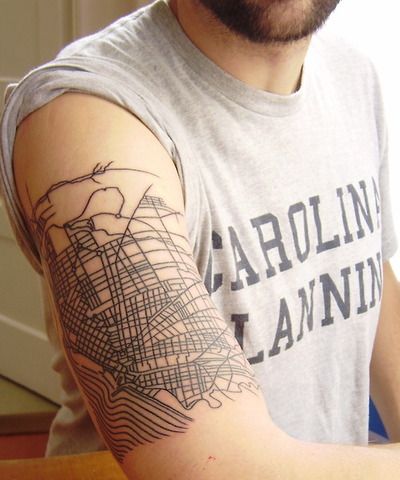 Gorgeous men’s arm’s architecture tattoo