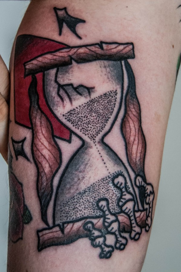 Gorgeous sand clock tattoo