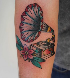 Gramophone and flower tattoo
