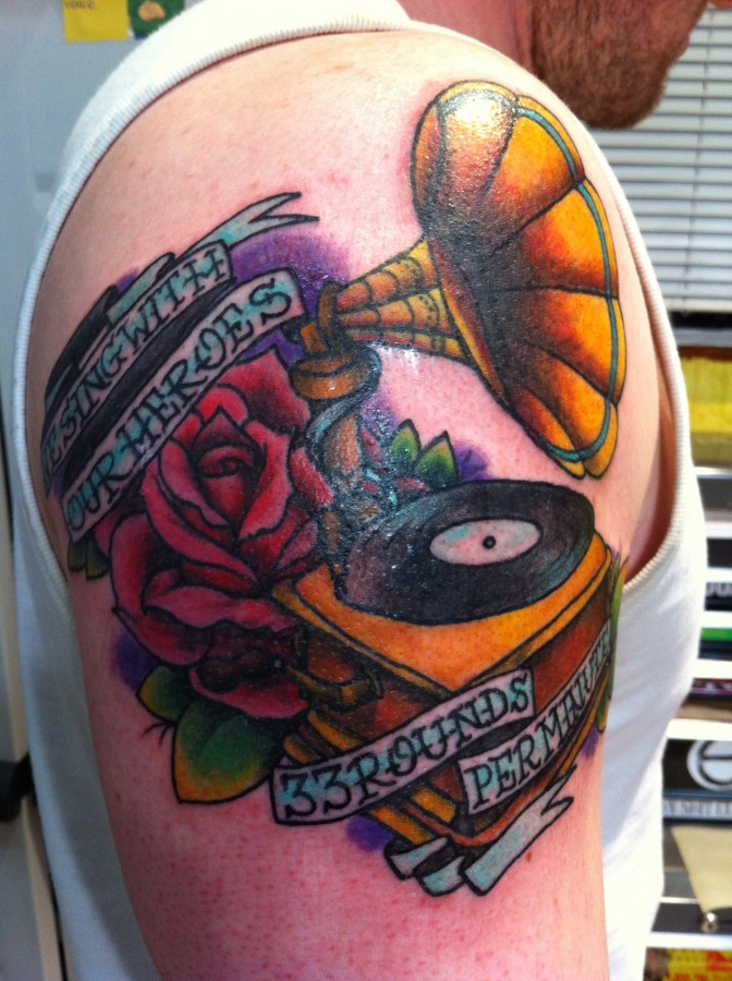 Gramophone and quote tattoo