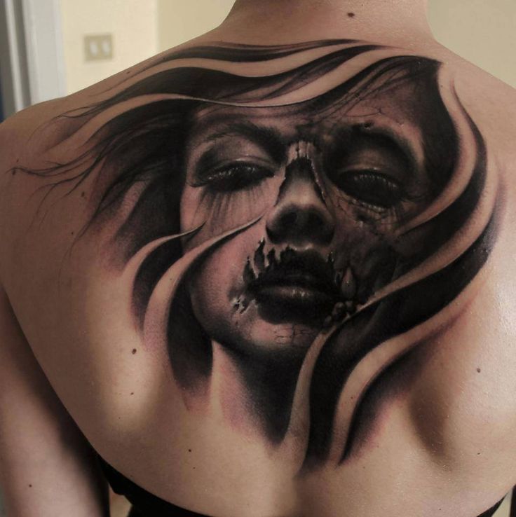 Great back tattoo by Riccardo Cassese