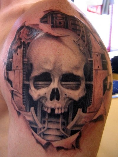 Great skull tattoo by Xavier Garcia Boix