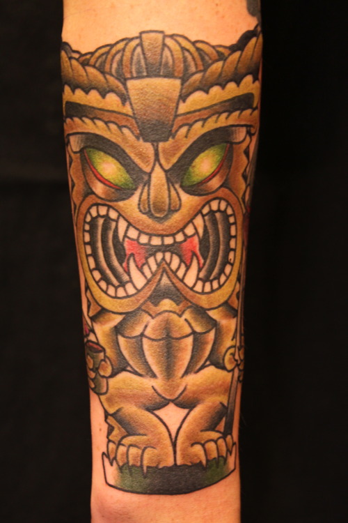 Great tiki arm tattoo