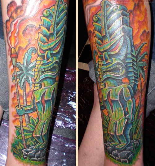 Green tiki tattoo