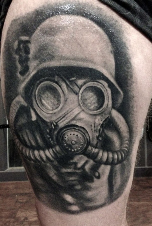 Grey ink gas mask tattoo