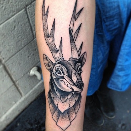 Grey ink geometric deer tattoo