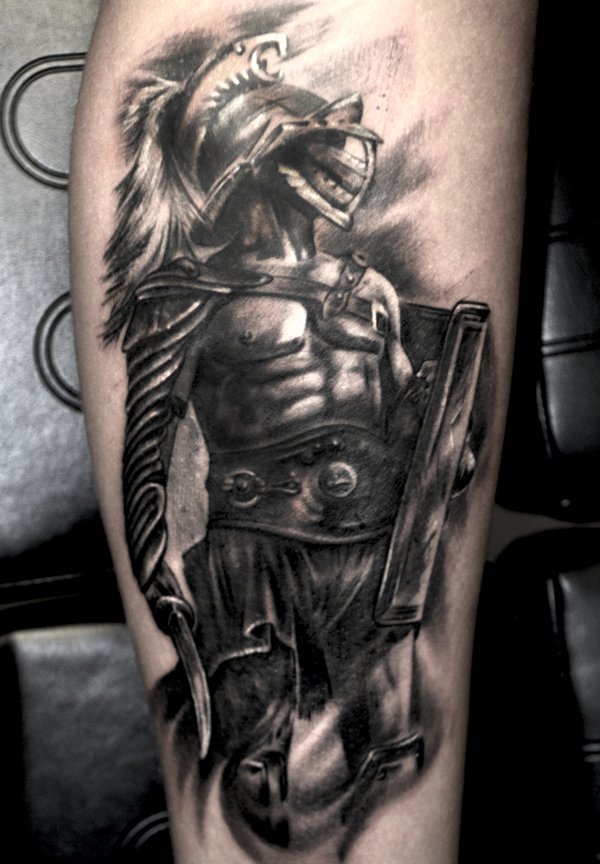 Grey ink gladiator tattoo