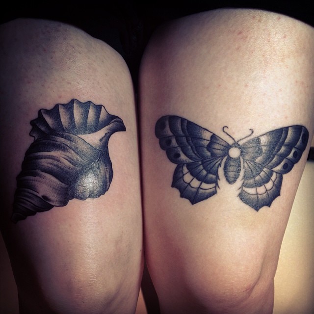 Grey ink shell tattoo