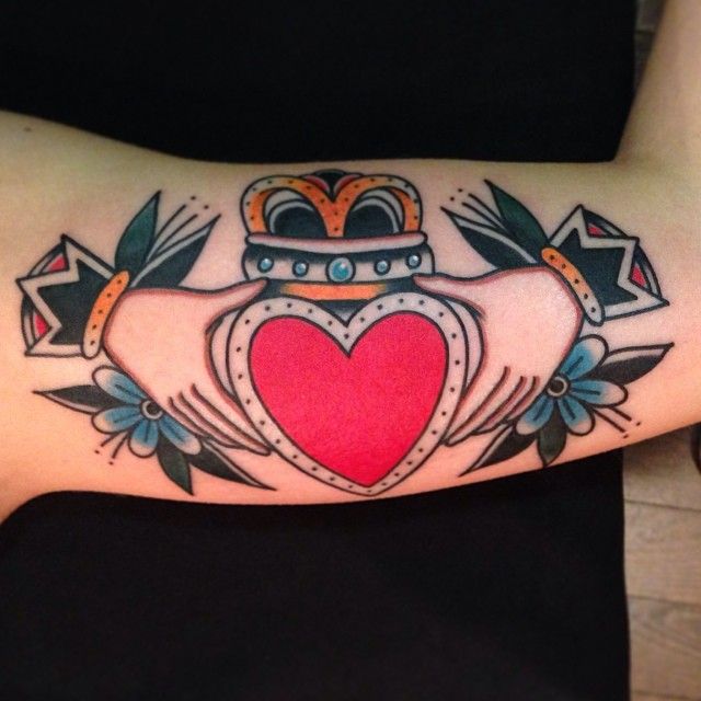 Heart and hands tattoo by Nick Oaks