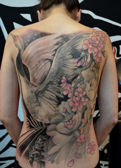 Incredible crane back tattoo