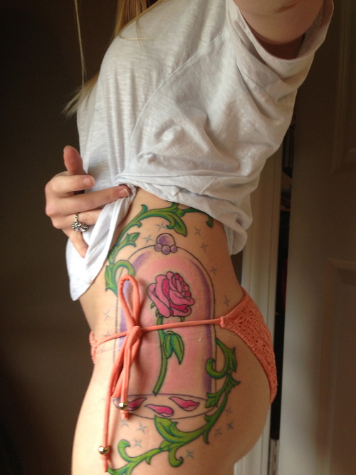 Incredible enhanted rose tattoo