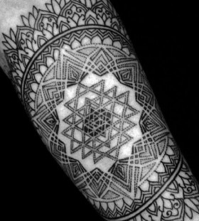 Incredible geometric tattoo by Brian Gomes