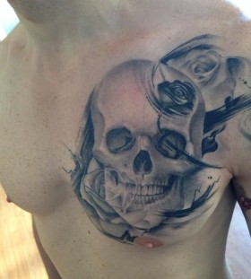 Incredible skull chest tattoo by Razvan Popescu