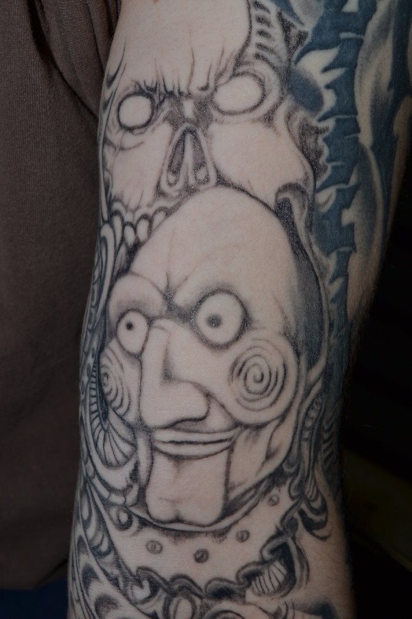 Jigsaw puppet tattoo