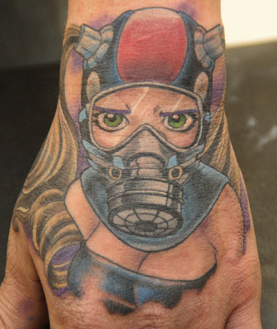 Kid with gas mask hand tattoo