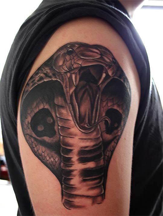 King cobra arm tattoo