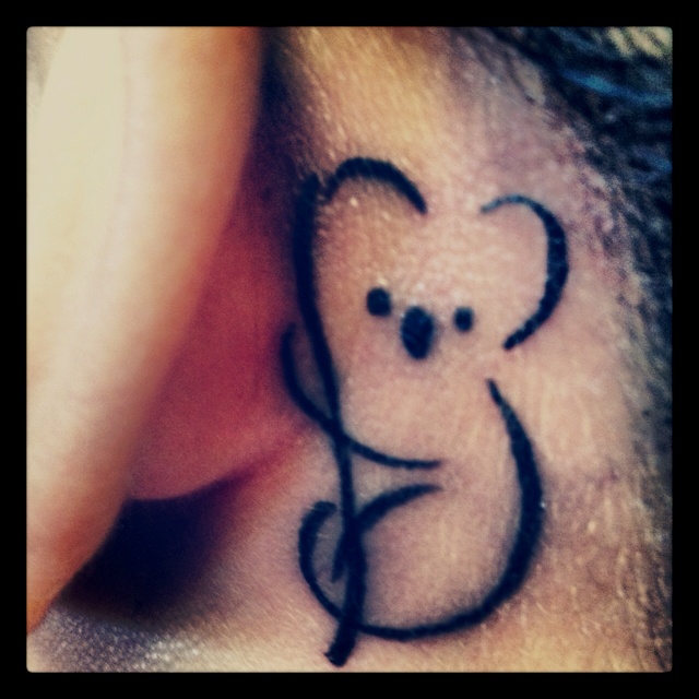 Koala bear under behind ear tattoo