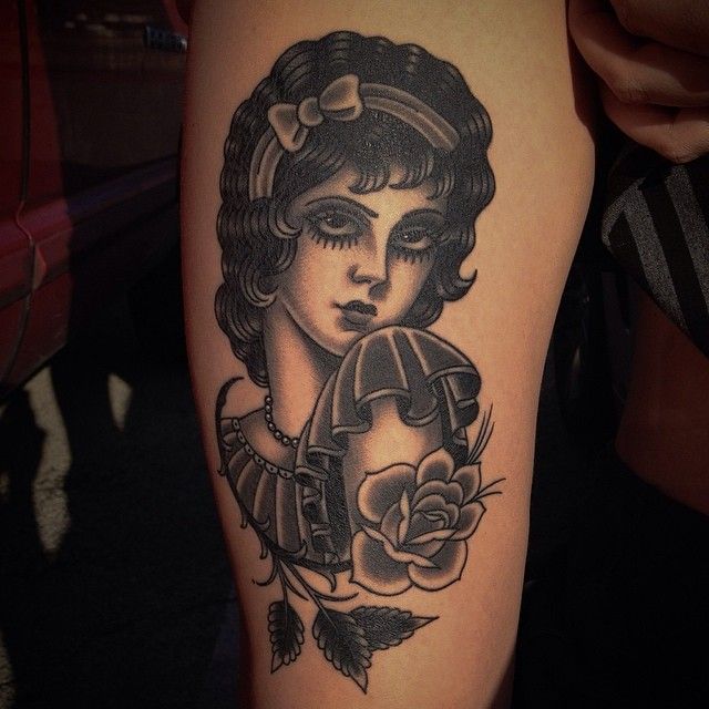 Lady in a dress tattoo