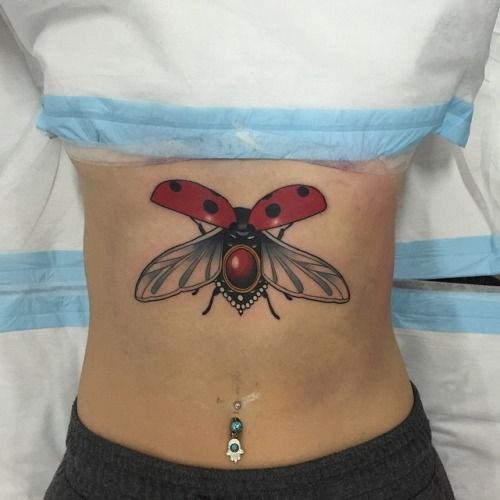 Ladybug tattoo by Dan Molloy