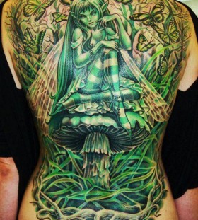 Large green fairy on mushroom tattoo