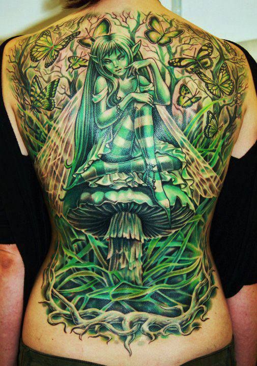 Large green fairy on mushroom tattoo