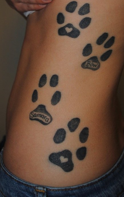 Large paws side tattoo