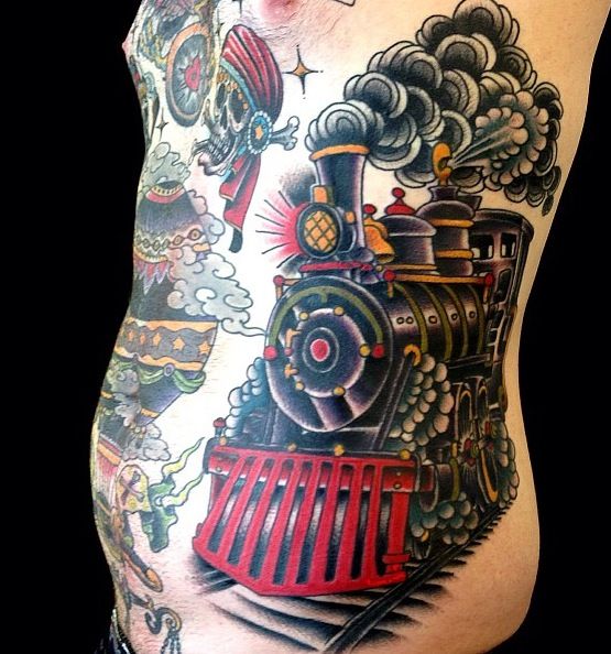 Large steaming train side tattoo