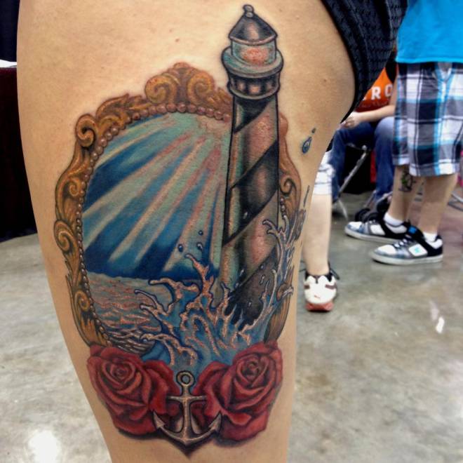 Lighthouse frame and roses tattoo