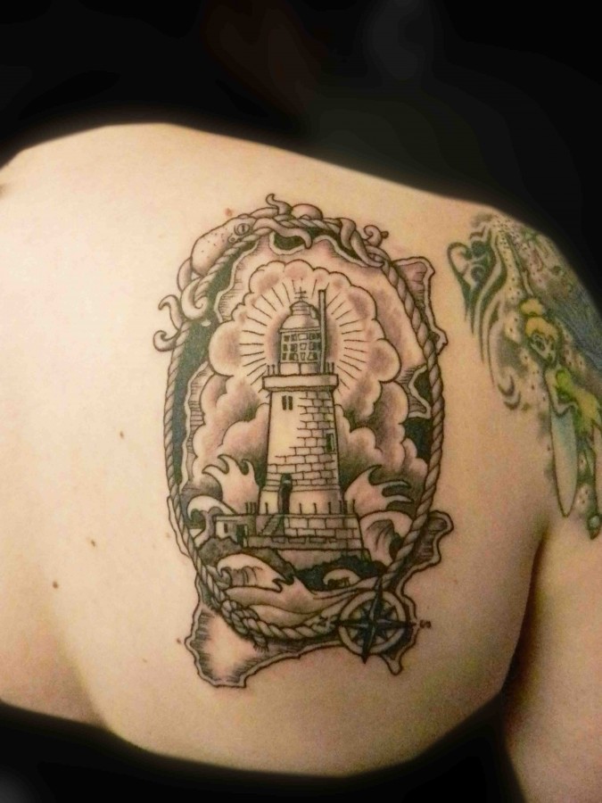 Lighthouse frame back tattoo