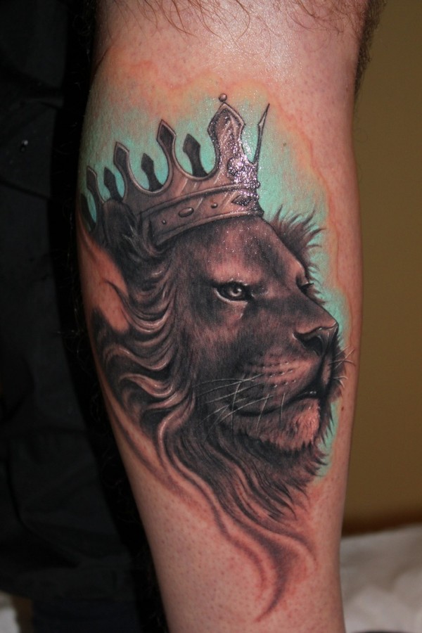 Lion with crown tattoo by Riccardo Cassese