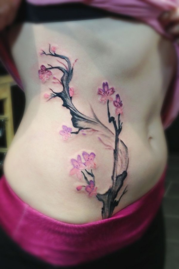 Lovely apple blossom tattoo