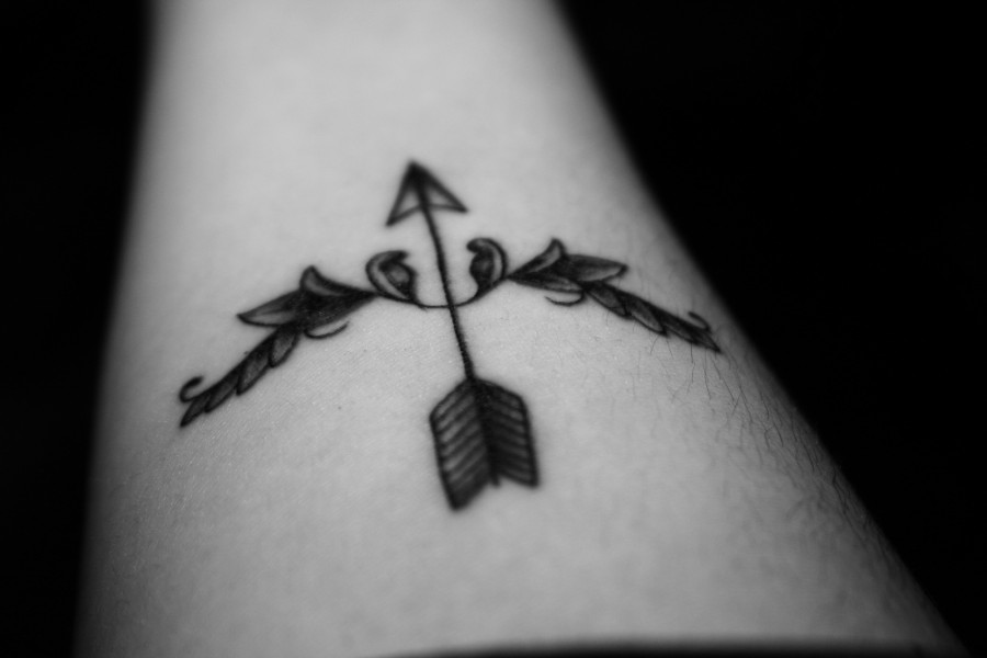 Lovely bow and arrow tattoo