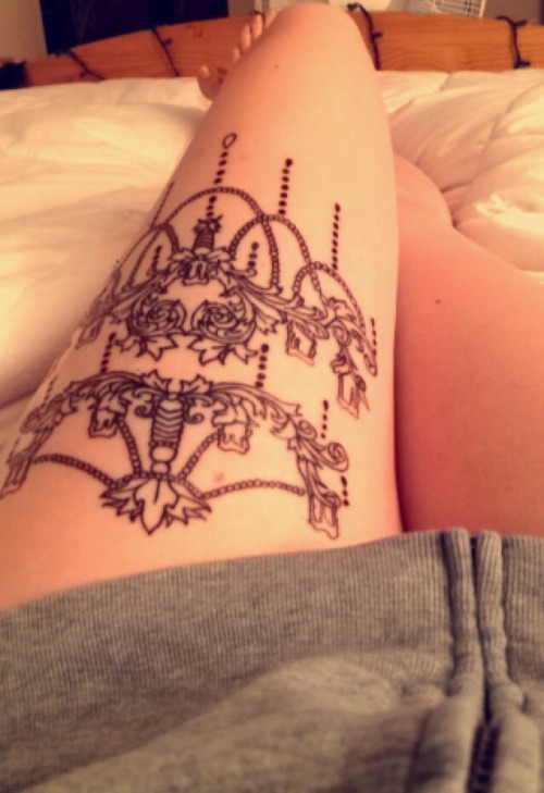 Lovely chandelier leg tattoo