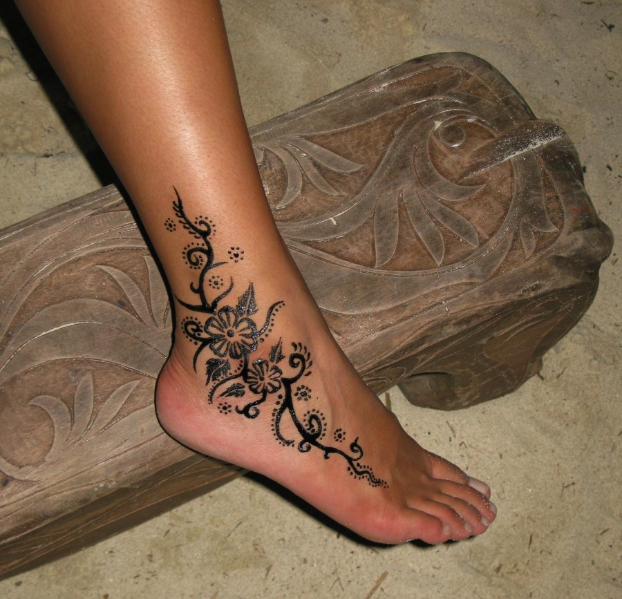 Lovely flower ankle tattoo