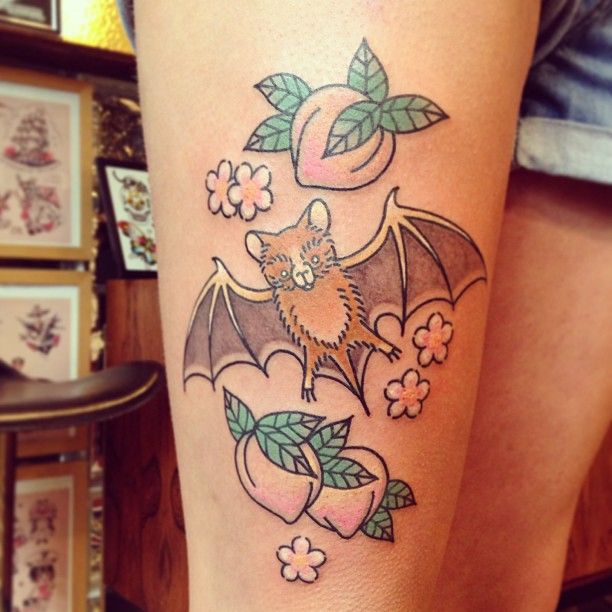 Lovely flowers and fruit tattoo