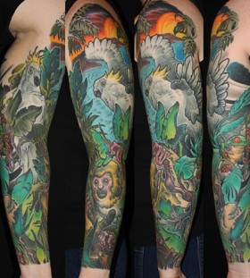 Lovely jungle animals arm tattoo