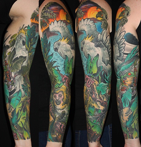 Lovely jungle animals arm tattoo