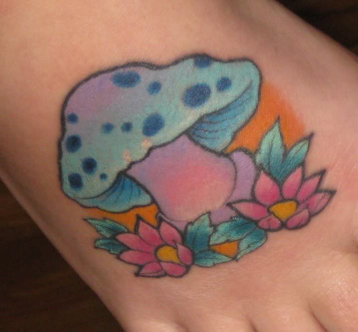 Lovely mushroom foot tattoo