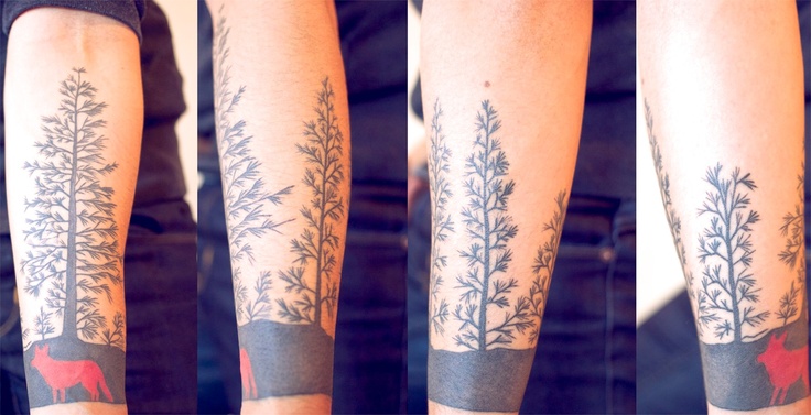 Lovely pine tree and wolf tattoo