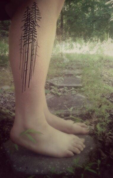 Lovely pine tree leg tattoo