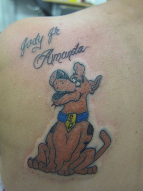 Lovely scooby doo back tattoo